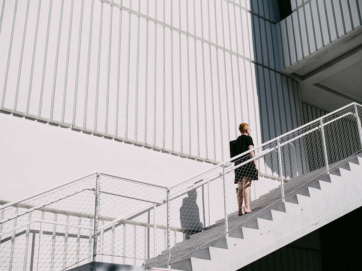 united states woman standing on stairway during daytime miami